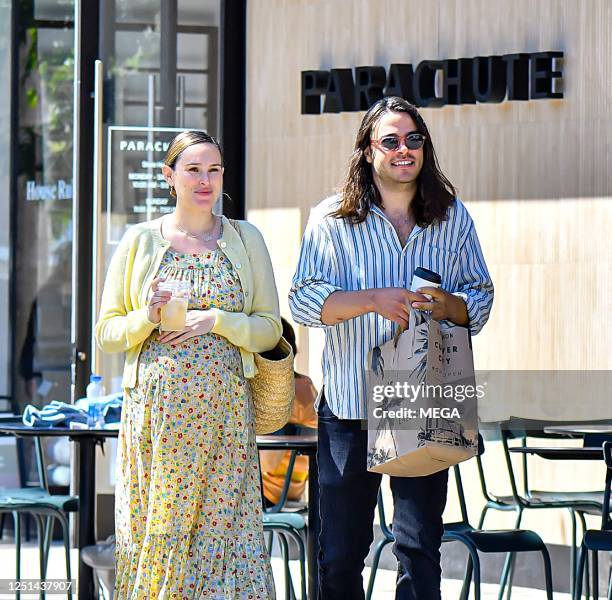 Rumer Willis and Derek Richard Thomas are seen leaving Erewhon Market on April 10, 2023 in Los Angeles, California.