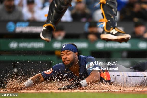 Corey Julks of the Houston Astros scores during the third inning against the Pittsburgh Pirates at PNC Park on April 10, 2023 in Pittsburgh,...