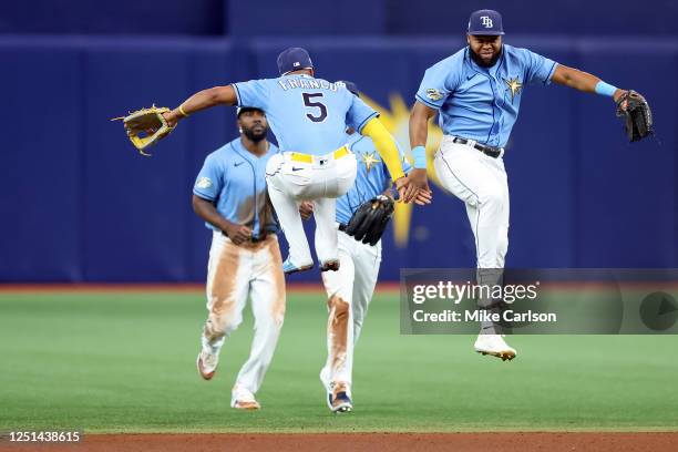 Wander Franco of the Tampa Bay Rays and Manuel Margot celebrate a win over the Boston Red Sox in a baseball game at Tropicana Field on April 10, 2023...