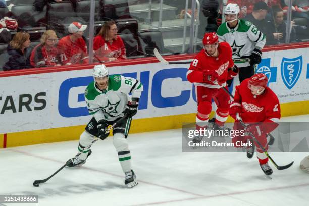 Tyler Seguin of the Dallas Stars handles the puck in Detroit Red Wings zone during the second period an NHL game at Little Caesars Arena on April 10,...