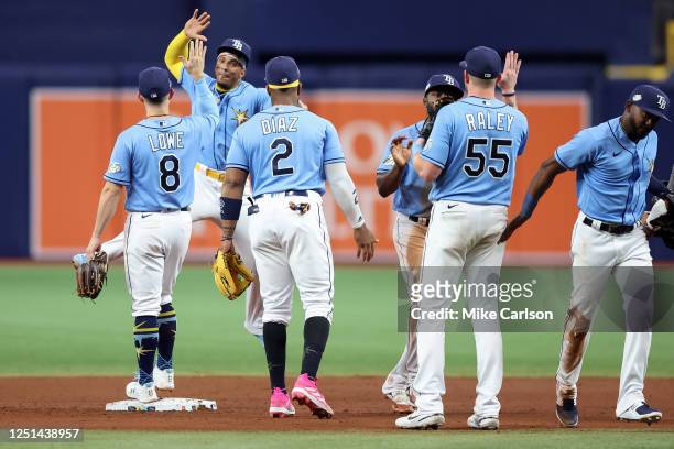 Members of the Tampa Bay Rays celebrate a win over the Boston Red Sox in a baseball game at Tropicana Field on April 10, 2023 in St. Petersburg,...