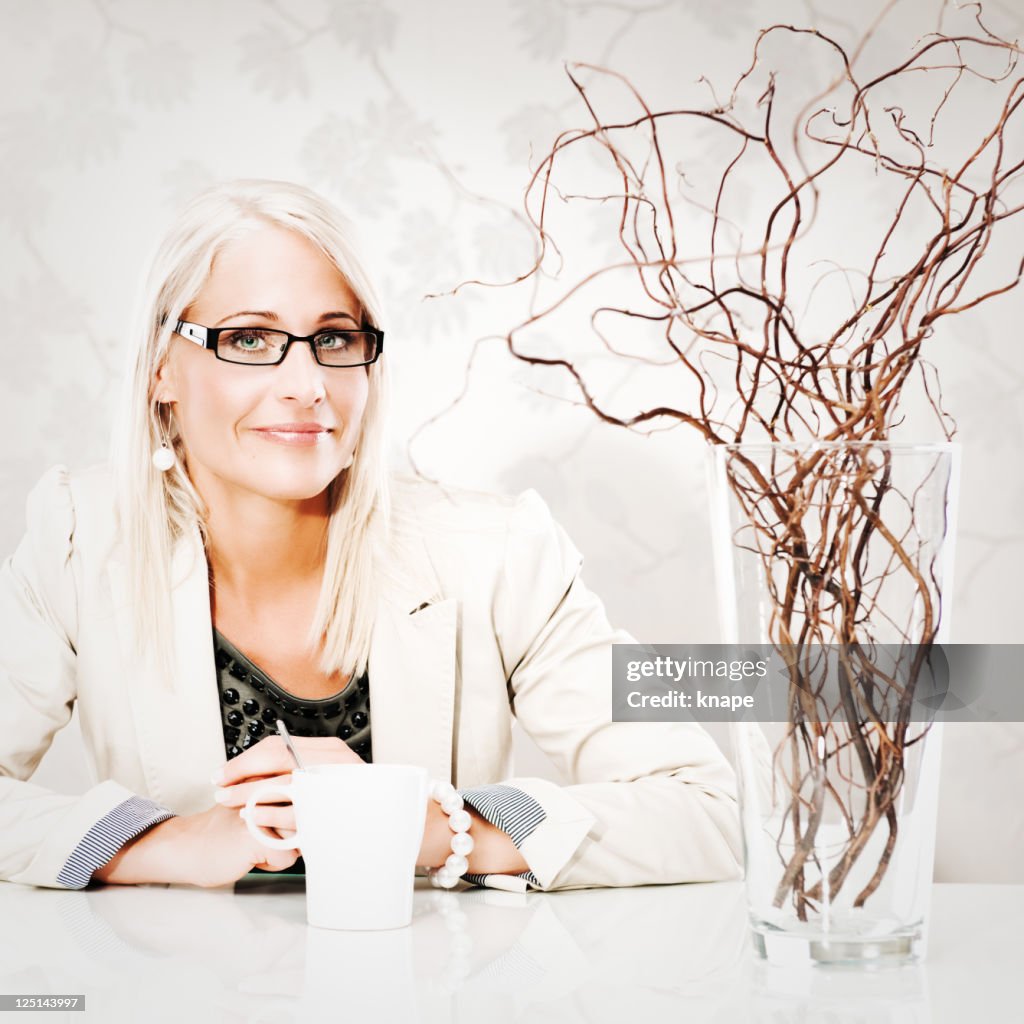 Business woman with coffee cup