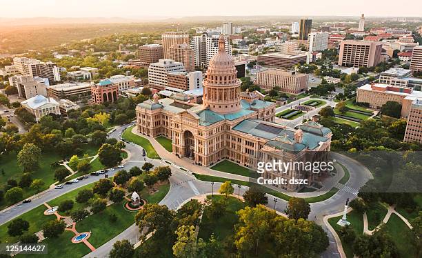 capitol building, aerial skyline, sunset, austin, tx,  texas state capital - austin texas sunset stock pictures, royalty-free photos & images