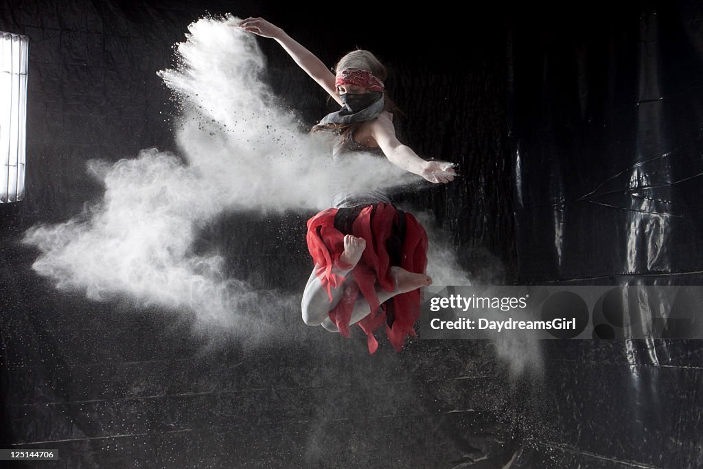 Woman Dancing in White Powder