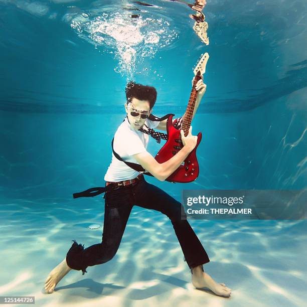 underwater rock and roll - music talent stock pictures, royalty-free photos & images