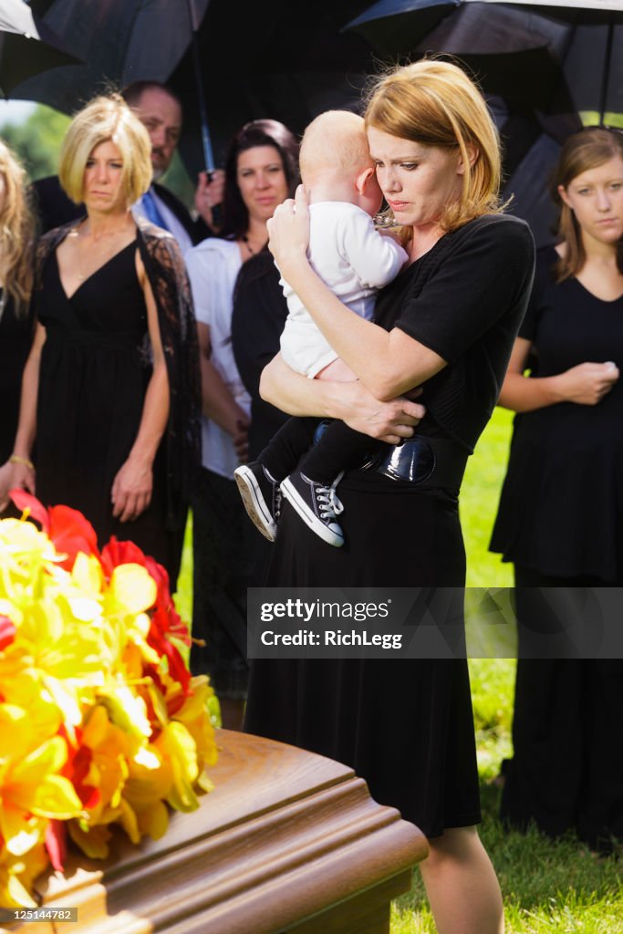 Mother and Baby at a Funeral