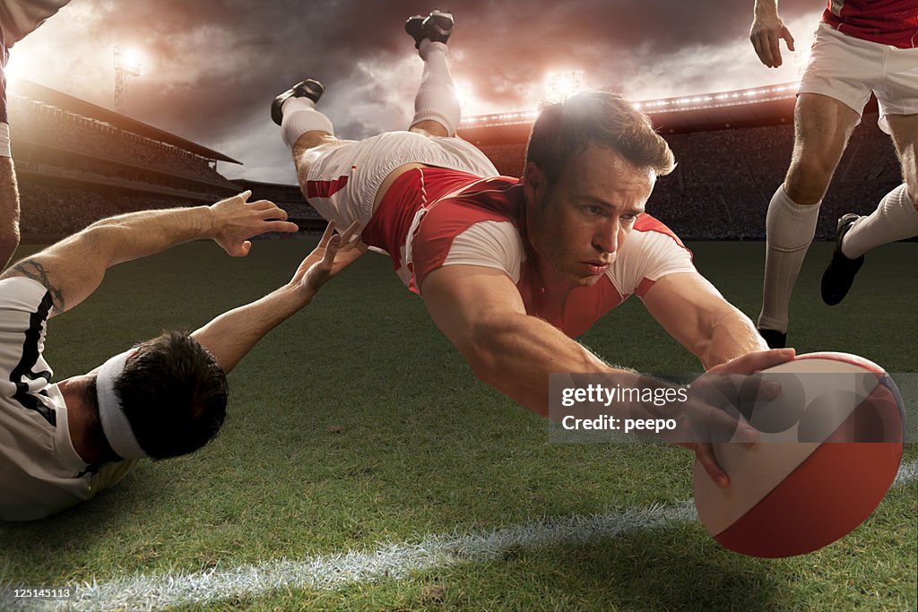 Rugby Player in Mid Air About To Score