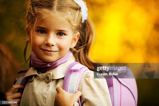 little schoolgirl - satchel stock pictures, royalty-free photos & images