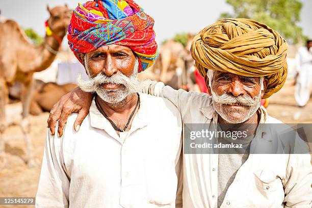 senior indian friends - pushkar stock pictures, royalty-free photos & images