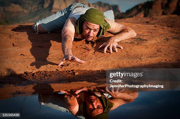 thirsty man in the desert - thirsty stock pictures, royalty-free photos & images