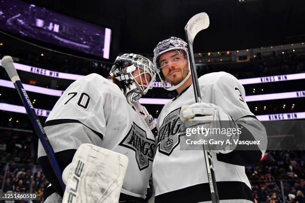 Joonas Korpisalo and Matt Roy of the Los Angeles Kings celebrate win against the Vancouver Canucks at Crypto.com Arena on April 10, 2023 in Los...