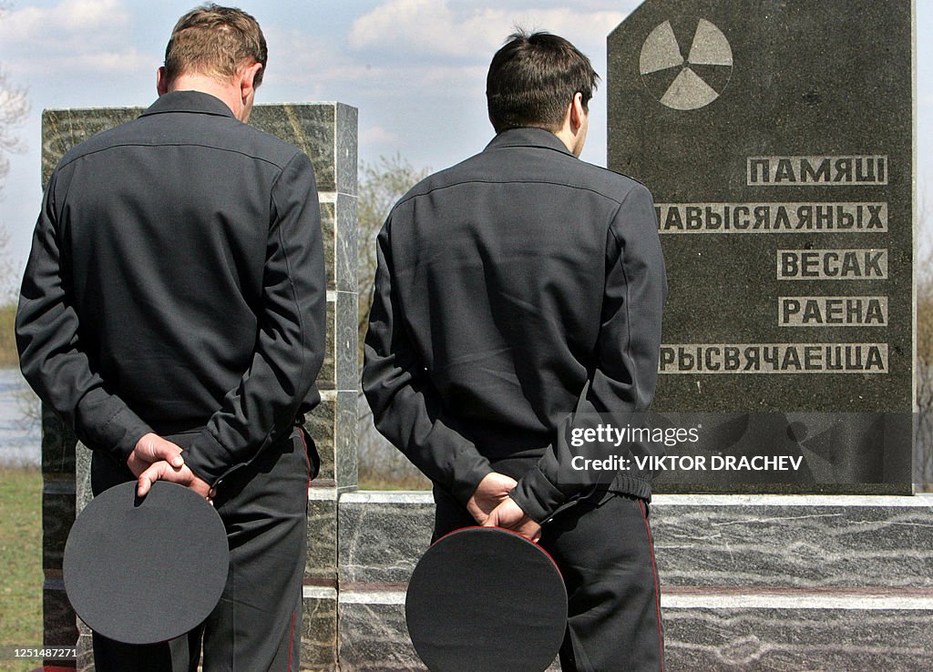 Chernobyl Rescuers Belarus policemen and former rescue team members pay respects to ...