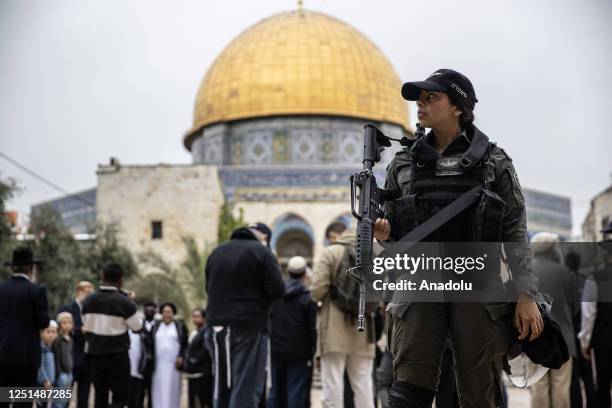 Israeli police take measures as far-right Jewish settlers raid the courtyard of Al-Aqsa Mosque in East Jerusalem on April 11, 2023.