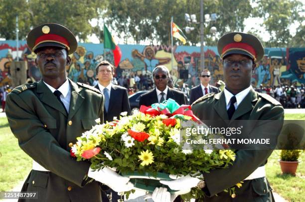 Portuguese Prime Minister Jose Manuel Durao Barroso with the Mayor of Maputo Eneas Comiche attend a wreath-laying ceremony at the momument of...