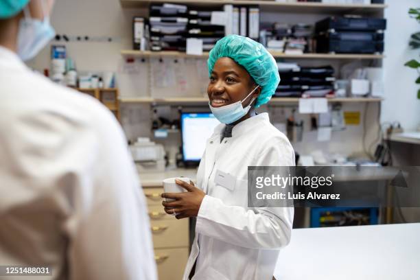 Medical scientists having a break in laboratory