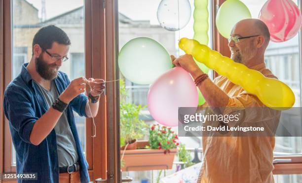 gay pride party at home - gay pride symbol stock pictures, royalty-free photos & images
