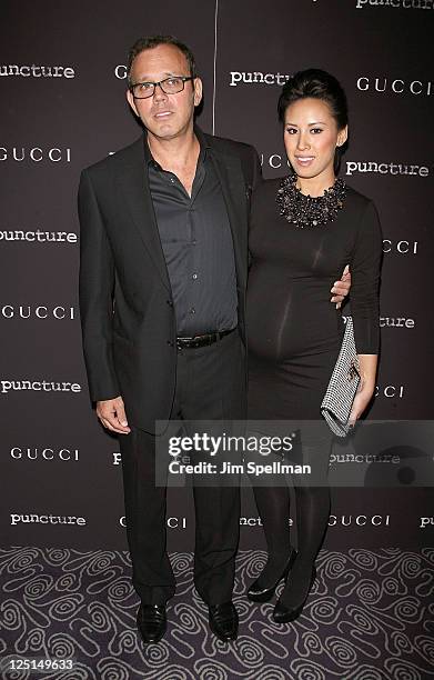 Executive Proucer Rod de Liano and wife attend the "Puncture" premiere at the Angelika Film Center on September 15, 2011 in New York City.