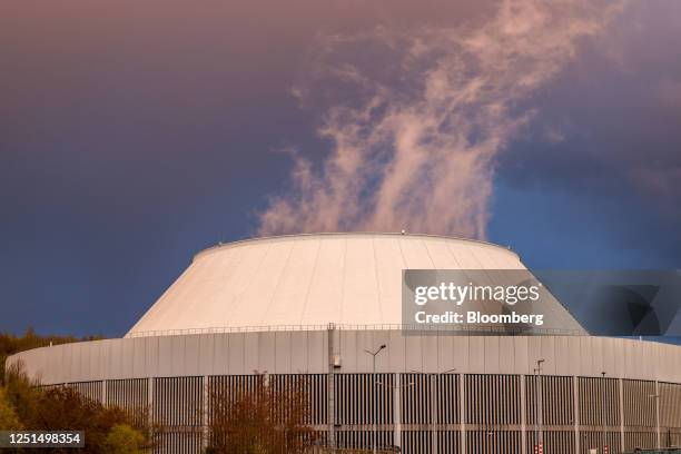 Water vapor rises from the hybrid cooling tower at the Neckarwestheim 2 Nuclear Power Station, operated by EnBW Energie Baden-Wuerttemberg AG, in...