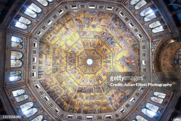 the mosaic ceiling in the battistero di san giovanni or baptistery in florence. some of the earliest works date from around 1225. - baptistery imagens e fotografias de stock