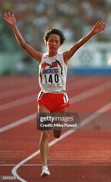 Junxia Wang wins the 10,000 metres in 30:49.30 at the World Athletics Championships. Mandatory Credit: Mike Powell/ALLSPORT