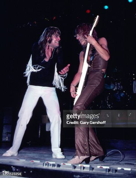 View of British Heavy Metal singer Ozzy Osbourne and American musician Randy Rhoads , on guitar, as they perform, during the 'Blizzard of Ozz Tour,'...