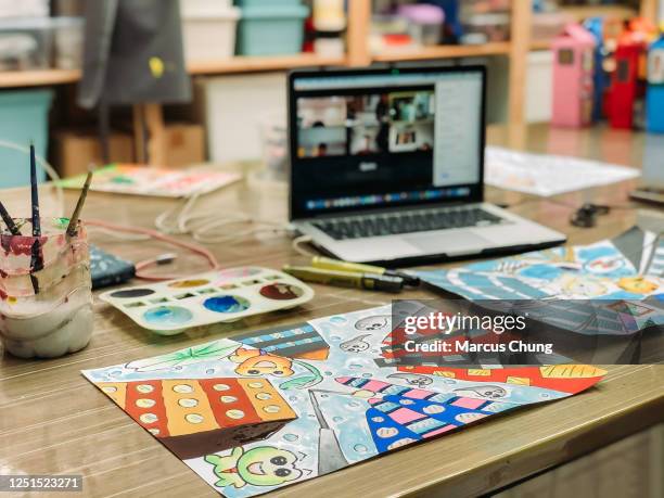 asian chinese female teacher teaching online class at art school - art class stock pictures, royalty-free photos & images