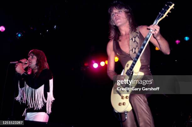 View of British Heavy Metal singer Ozzy Osbourne and American musician Randy Rhoads , on guitar, as they perform, during the 'Blizzard of Ozz Tour,'...