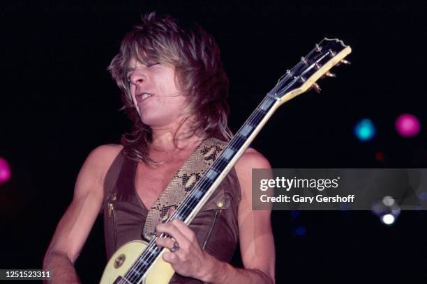 American Heavy Metal musician Randy Rhoads plays guitar as he performs, during the 'Blizzard of Ozz Tour,' at Nassau Coliseum, Uniondale, New York,...