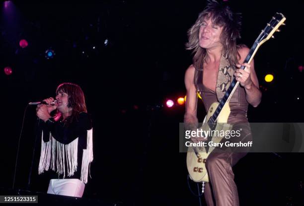 View of British Heavy Metal singer Ozzy Osbourne and American musician Randy Rhoads , on guitar, as they perform, during the 'Blizzard of Ozz Tour,'...