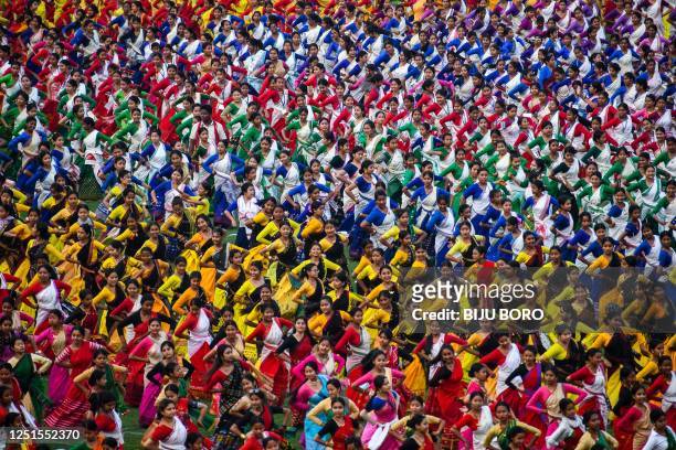Bihu dancers take part in rehearsals days before the Guinness World Record event at Sarusajai Stadium in Guwahati, on April 11, 2023.