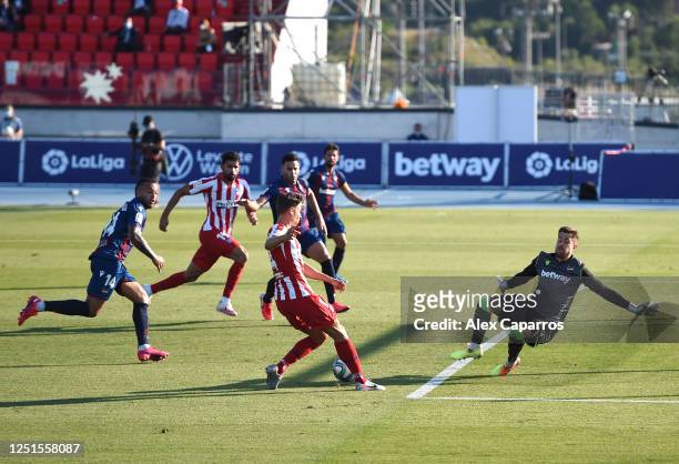 Marcos Llorente of Atletico Madrid assists an own goal scored by Bruno Gonzalez of Levante during the Liga match between Levante UD and Club Atletico...
