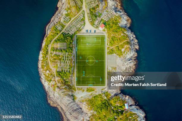 aerial view of a football field on an island in henningsvær, norway - soccer field above stock pictures, royalty-free photos & images