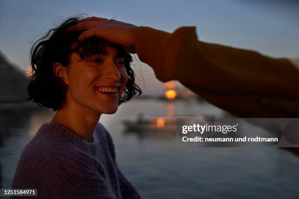 affectionate couple enjoying city sunset-berlin, germany 2020 - romantic sunset stock pictures, royalty-free photos & images