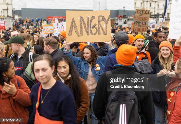 Junior doctor holds a placard that reads "Angry" at a rally during strike action in Trafalgar Square in London, UK, on Tuesday, April 11, 2023. Tens...