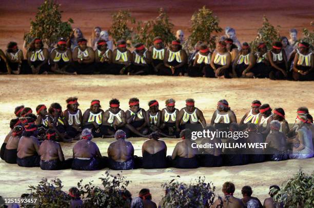 Aboriginals perform in the "Djakapurra and clans and Wandjina" segment 15 September 2000 during the opening ceremony of the Sydney 2000 Summer...