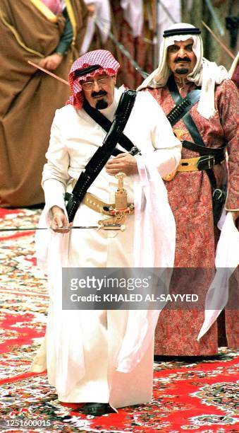 Saudi Arabian Crown Prince Abdallah ibn Abdel Aziz dances 27 January in Riyadh during the celebrations of the 100th anniversary of al-Saud dynasty....
