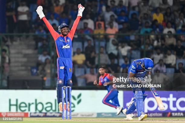 Delhi Capitals' Abishek Poral appeals unsuccessfully against the Leg Before Wicket decision of Mumbai Indians' Rohit Sharma during the Indian Premier...