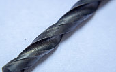 Close up on the cutting edge of a carbon drill, used in wood and soft materials
