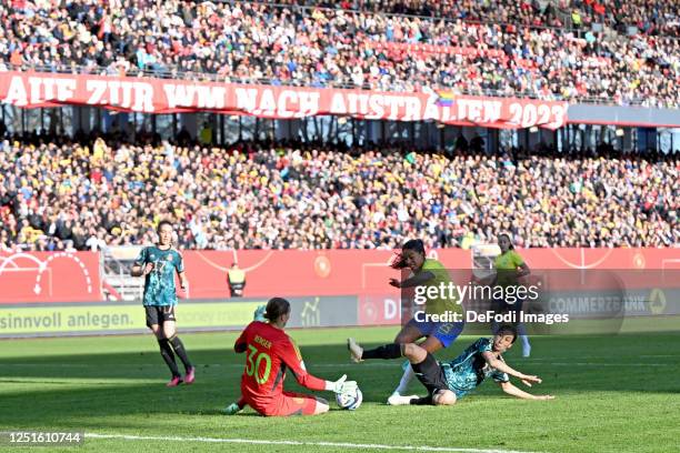 Goalkeeper Ann-Katrin Berger of Germany, Gabi Nunes of Brazil and Sara Doorsoun of Germany battle for the ball during the Women's international...