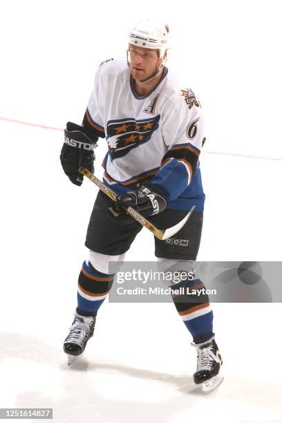 Calle Johansson of the Washington Capitals looks on during the NHL hockey game against the Carolina Hurricanes at MCI Center on January 22, 2003 in...