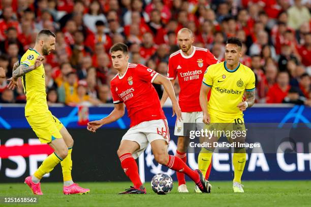 Marcelo Brozovic of FC Internazionale, Antonio Silva of Benfica Lissabon and Lautaro Martinez of FC Internazionale during the UEFA Champions League...