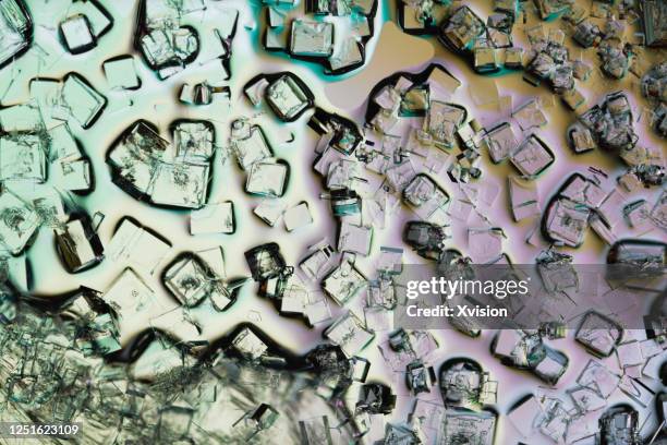 sodium chloride crystal under microscopy - salt mineral stock pictures, royalty-free photos & images