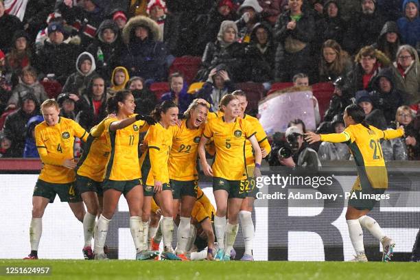 Australia's Charlotte Grant celebrates scoring their side's second goal of the game during the Alzheimer's Society International at the Gtech...