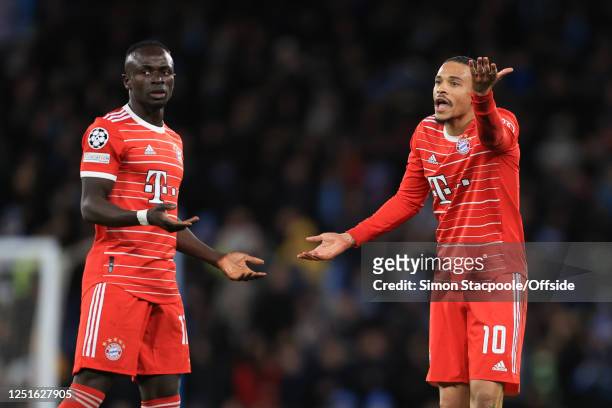Leroy Sane of Bayern Munich and Sadio Mane of Bayern Munich moan at each other during the UEFA Champions League quarterfinal first leg match between...