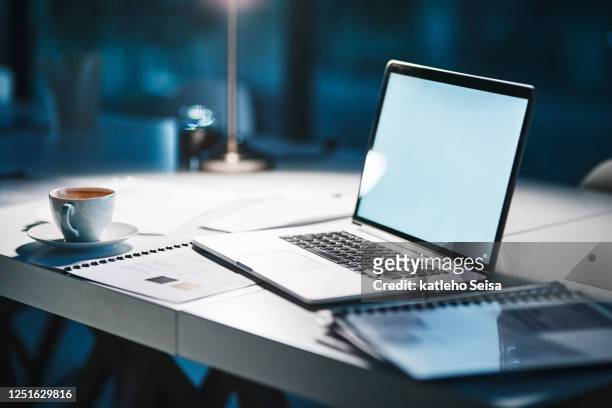 the perfect setting to complete work - laptop imagens e fotografias de stock