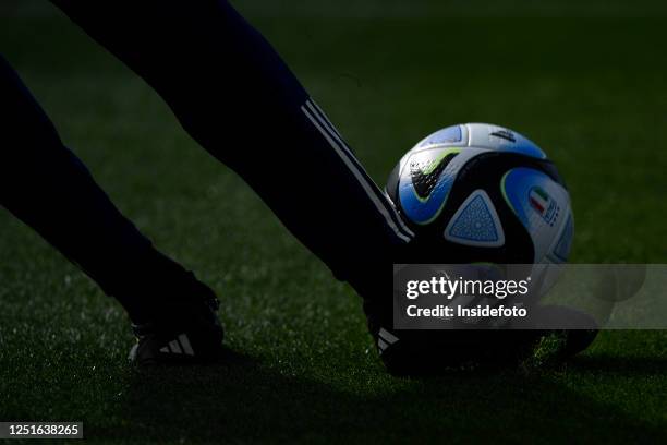 An assistant coach wearing Adidas boots kicks the ball during the friendly football match between Italy and Colombia. Italy won 2-1 over Colombia.