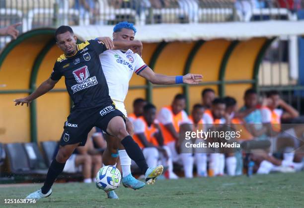 Luiz Enrique of Volta Redonda FC competes for the ball with Jacare of EC Bahia ,during the Third Round First Leg - Copa do Brasil match between Volta...