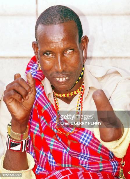 Kipise Lourolkeek poses outside the Houses of Parliament 17 July 2002 in London, before taking part in the mediation of Masai claims against the...