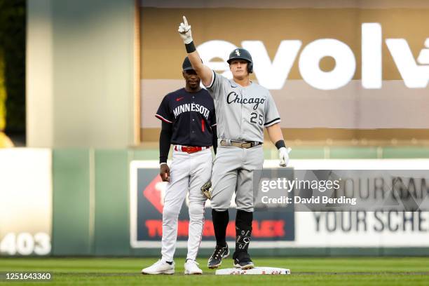 Andrew Vaughn of the Chicago White Sox celebrates his two- run double against the Minnesota Twins in the first inning at Target Field on April 11,...