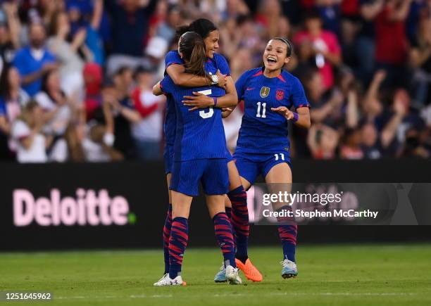 Missouri , United States - 11 April 2023; Alana Cook of United States celebrates with teammate Kelley O'Hara and Sophia Smith, right, after scoring...